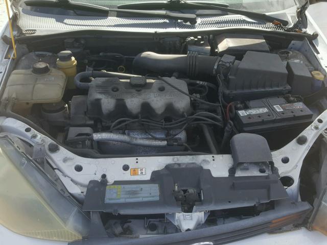 1FAFP33P24W189596 - 2004 FORD FOCUS LX WHITE photo 7