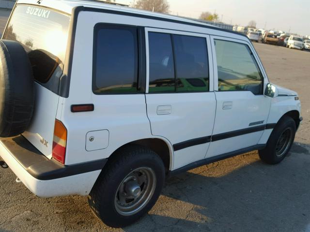 2S3TD03V9V6404777 - 1997 SUZUKI SIDEKICK J WHITE photo 9