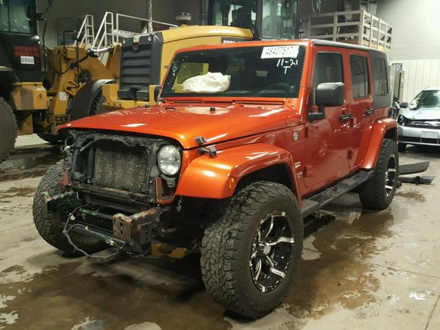 1J4GA59109L787672 - 2009 JEEP WRANGLER U ORANGE photo 2