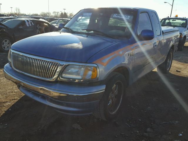 1FTRX17W72KE06447 - 2002 FORD F150 BLUE photo 2