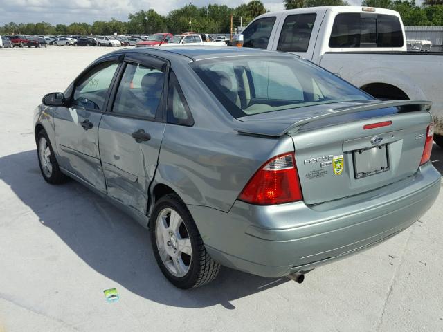 1FAFP34N85W252313 - 2005 FORD FOCUS ZX4 GREEN photo 3