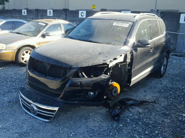 WVGAV75N09W523317 - 2009 VOLKSWAGEN TIGUAN S BLACK photo 2