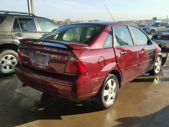 1FAFP34N16W227495 - 2006 FORD FOCUS ZX4 RED photo 4