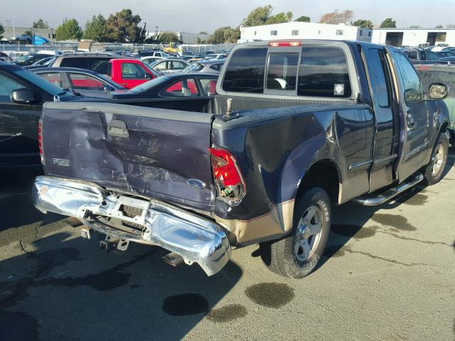 1FTRX17W1XNA10570 - 1999 FORD F150 BLUE photo 4