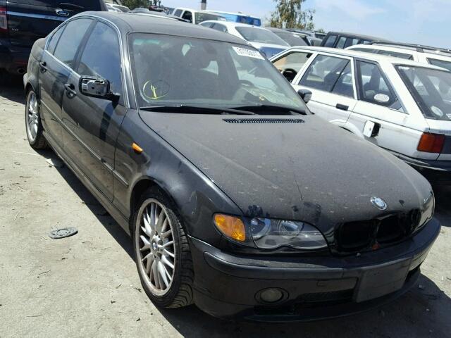 WBAEV53412KM01242 - 2002 BMW 330 I BLACK photo 1