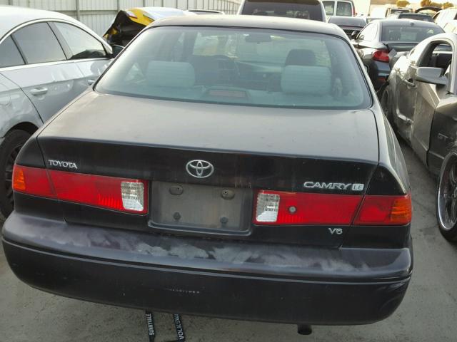 4T1BF28K5YU934552 - 2000 TOYOTA CAMRY LE BLACK photo 4