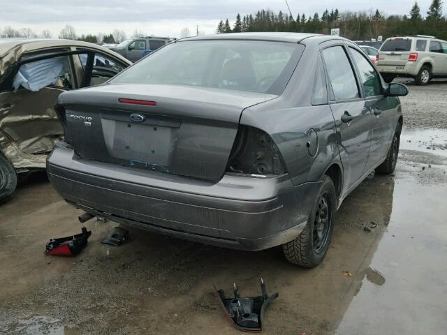 1FAFP34N47W337300 - 2007 FORD FOCUS ZX4 GRAY photo 4