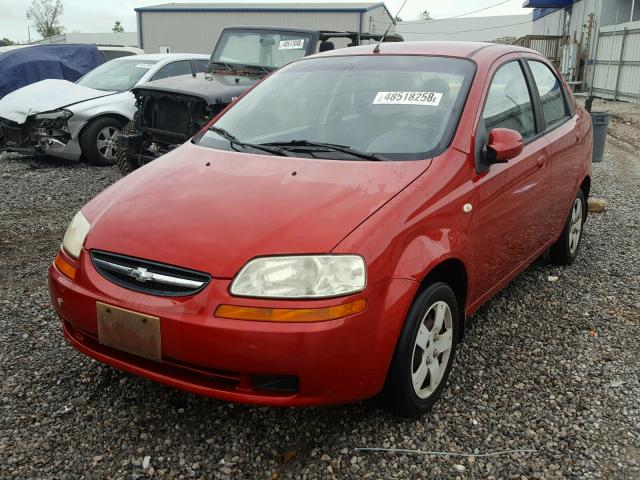 KL1TD56606B589887 - 2006 CHEVROLET AVEO BASE Czerwony zdjęcie 2