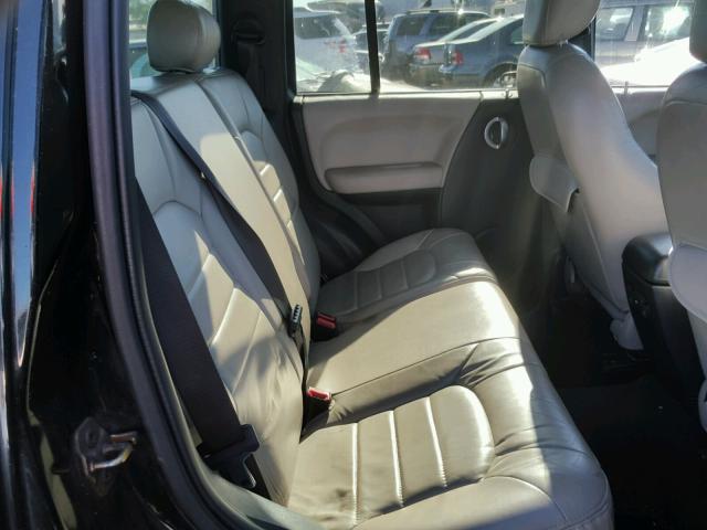 1J8GL58K32W283852 - 2002 JEEP LIBERTY LI BLACK photo 6