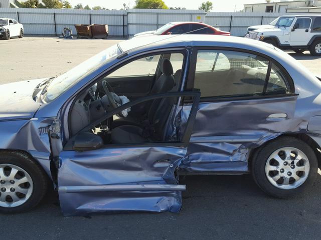 KNADC125546339358 - 2004 KIA RIO BLUE photo 9