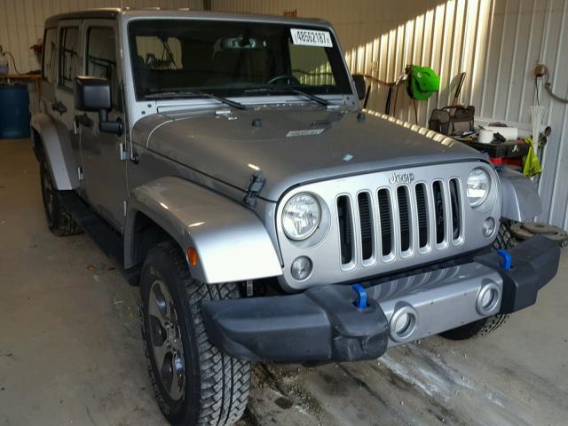 1C4BJWEG6GL285648 - 2016 JEEP WRANGLER U SILVER photo 1