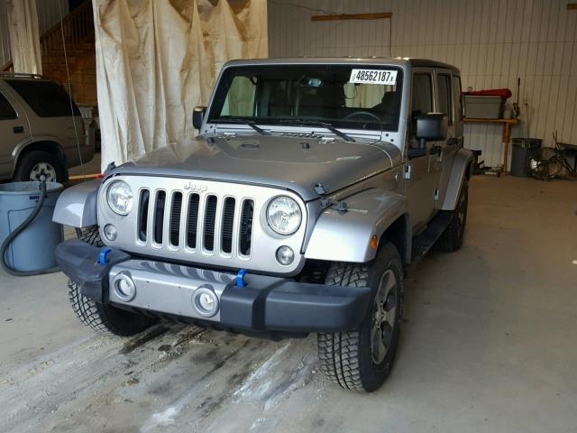 1C4BJWEG6GL285648 - 2016 JEEP WRANGLER U SILVER photo 2