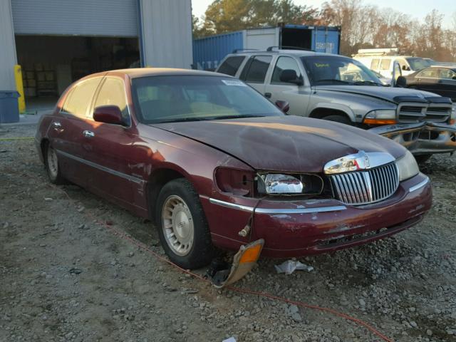 1LNHM81W8XY627349 - 1999 LINCOLN TOWN CAR E BURGUNDY photo 1