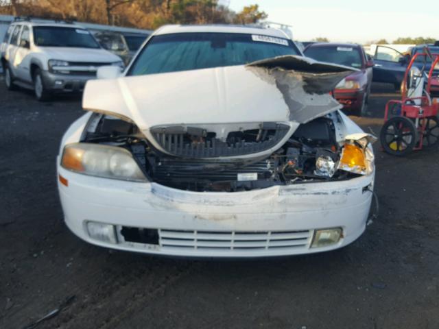 1LNHM87A8YY844719 - 2000 LINCOLN LS WHITE photo 7