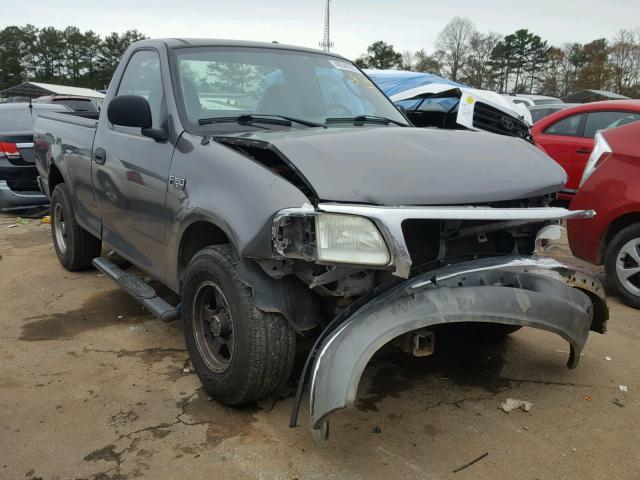 2FTRF17294CA95661 - 2004 FORD F-150 HERI GRAY photo 1