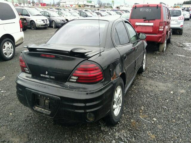 1G2NF52F32C321894 - 2002 PONTIAC GRAND AM S BLACK photo 4