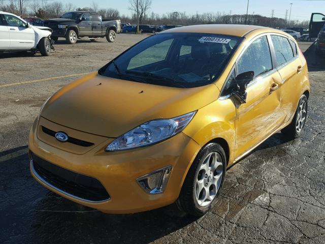 3FADP4FJ7BM100283 - 2011 FORD FIESTA SES YELLOW photo 2