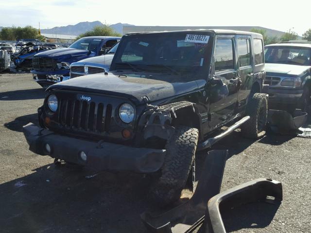 1J4BA3H14BL640390 - 2011 JEEP WRANGLER U BLACK photo 2