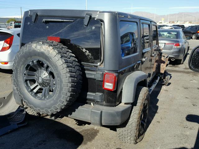 1J4BA3H14BL640390 - 2011 JEEP WRANGLER U BLACK photo 4