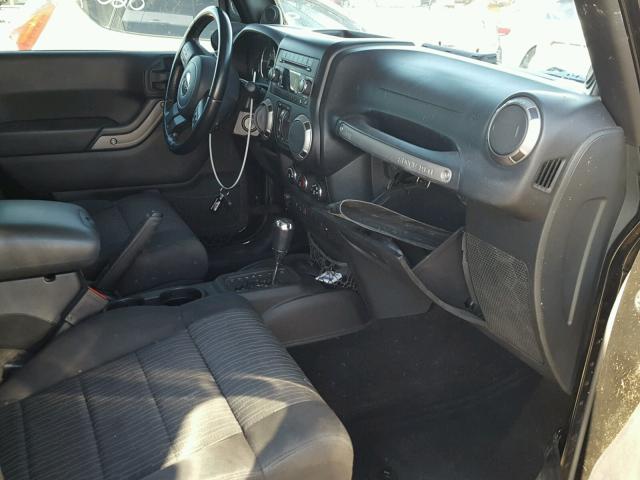 1J4BA3H14BL640390 - 2011 JEEP WRANGLER U BLACK photo 5