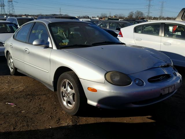 1FAFP53S7XG197336 - 1999 FORD TAURUS SE SILVER photo 1