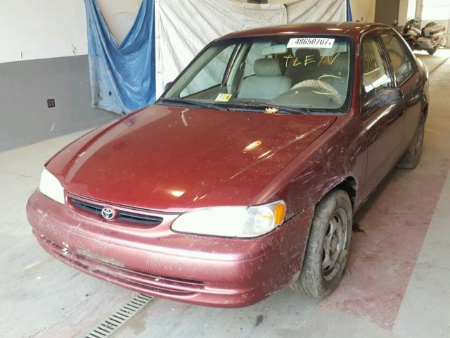 2T1BR12EXXC123348 - 1999 TOYOTA COROLLA VE RED photo 2