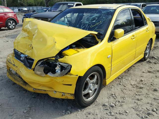 JA3AJ86E23U121692 - 2003 MITSUBISHI LANCER OZ YELLOW photo 2