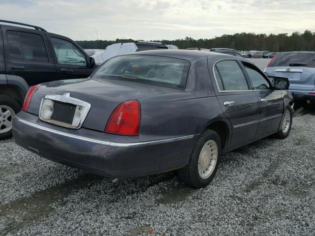 1LNHM81WX1Y732126 - 2001 LINCOLN TOWN CAR E GRAY photo 4