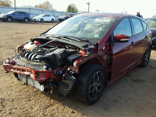 1FADP3K22GL300411 - 2016 FORD FOCUS SE RED photo 2