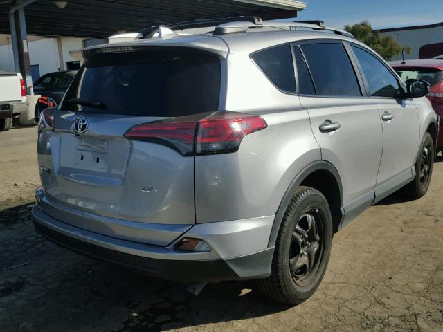 2T3ZFREV9GW306442 - 2016 TOYOTA RAV4 LE SILVER photo 4