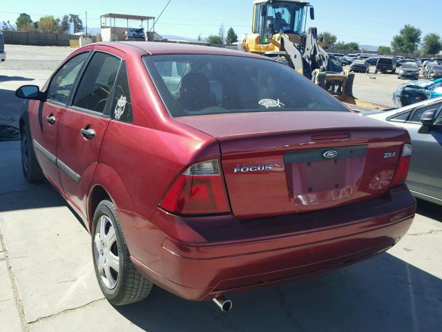 1FAFP34N55W101784 - 2005 FORD FOCUS ZX4 RED photo 3