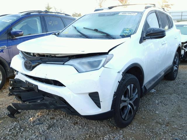 2T3ZFREV1GW237049 - 2016 TOYOTA RAV4 LE WHITE photo 2