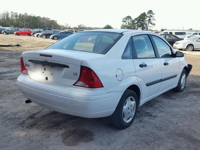 1FAFP33P0YW242477 - 2000 FORD FOCUS LX WHITE photo 4