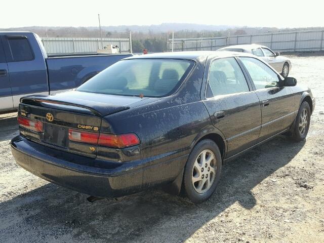 4T1BF28K0XU075286 - 1999 TOYOTA CAMRY LE BLACK photo 4