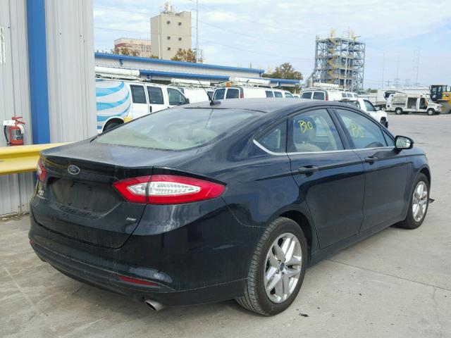 1FA6P0H75G5135579 - 2016 FORD FUSION SE BLUE photo 4