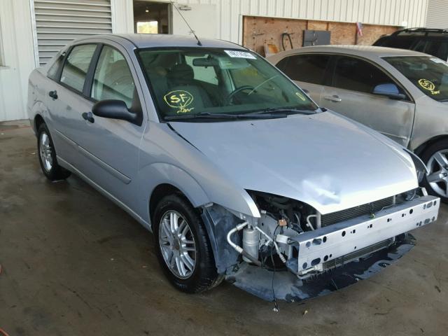 1FAFP34N95W223953 - 2005 FORD FOCUS ZX4 GRAY photo 1