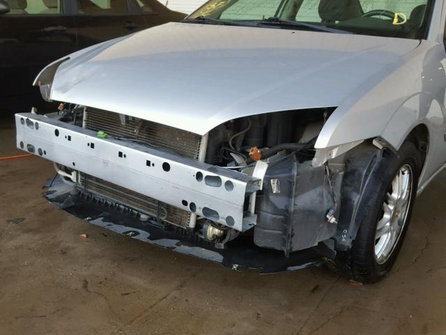 1FAFP34N95W223953 - 2005 FORD FOCUS ZX4 GRAY photo 9