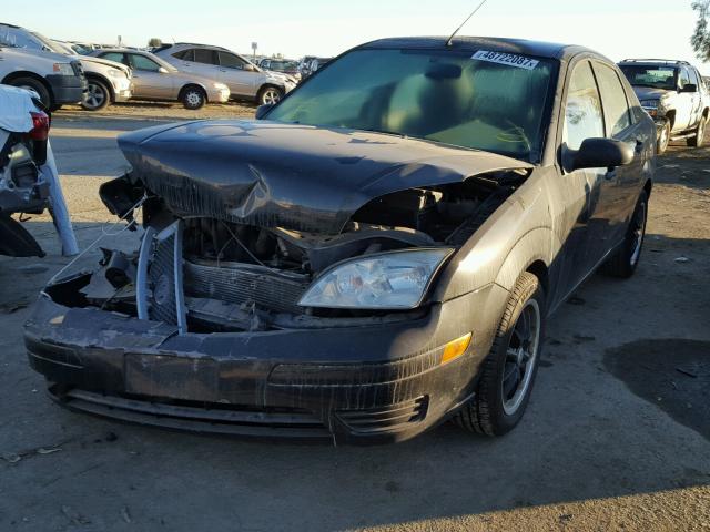 1FAFP34N37W158553 - 2007 FORD FOCUS ZX4 BLACK photo 2