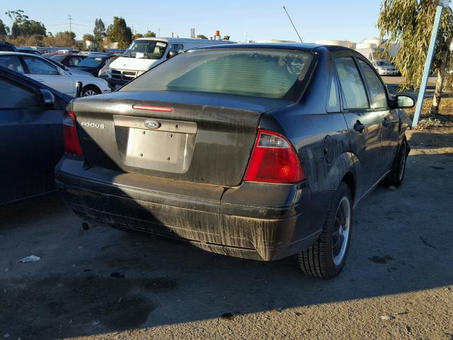 1FAFP34N37W158553 - 2007 FORD FOCUS ZX4 BLACK photo 4