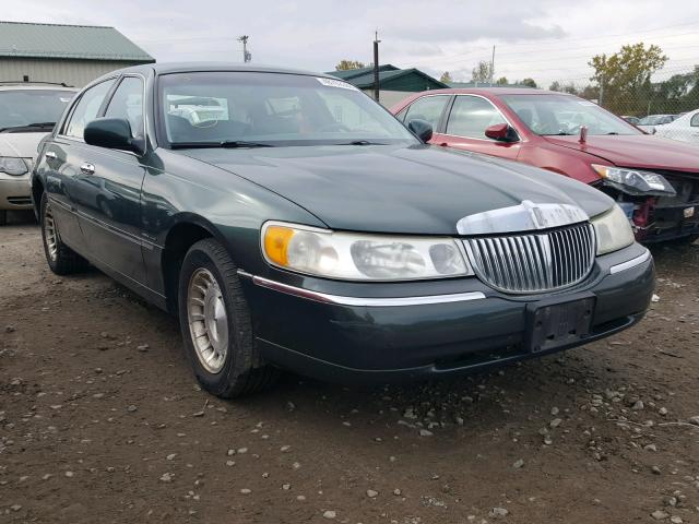 1LNHM81W7XY705720 - 1999 LINCOLN TOWN CAR E GREEN photo 1