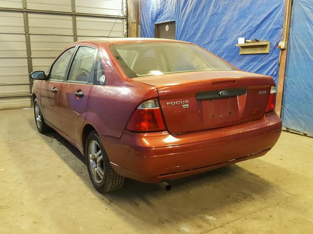 1FAFP34N45W169185 - 2005 FORD FOCUS ZX4 RED photo 3