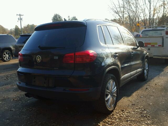 WVGAV3AX2DW574049 - 2013 VOLKSWAGEN TIGUAN S BLACK photo 4