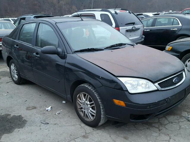 1FAHP34N06W238660 - 2006 FORD FOCUS ZX4 BLACK photo 1