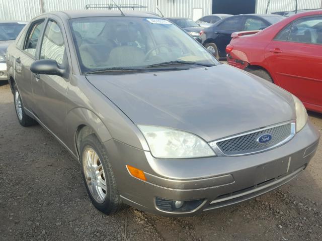 1FAFP34N05W152884 - 2005 FORD FOCUS ZX4 GRAY photo 1