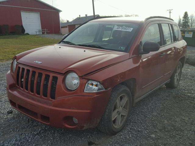 1J8FF47WX8D557439 - 2008 JEEP COMPASS SP ORANGE photo 2