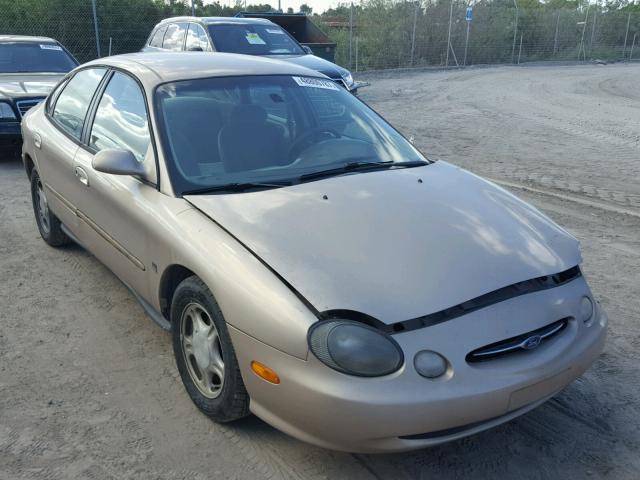 1FAFP53S0XG100851 - 1999 FORD TAURUS SE GOLD photo 1