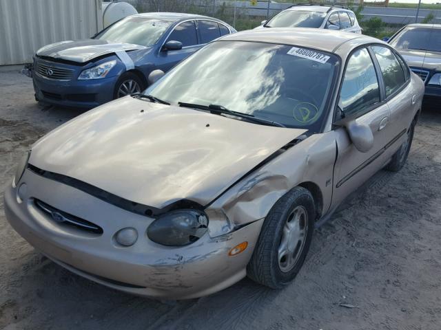 1FAFP53S0XG100851 - 1999 FORD TAURUS SE GOLD photo 2