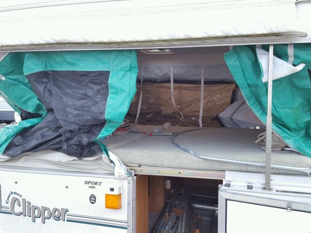 1TC1C505X55000137 - 2005 COACH CLIPPER WHITE photo 10