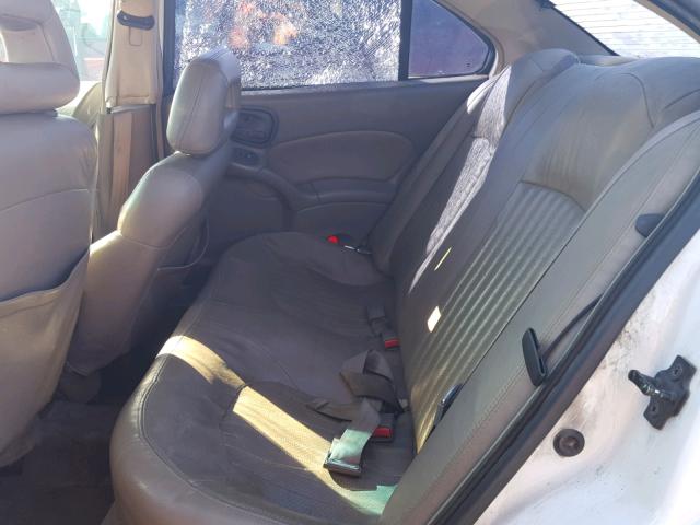 1G2NE52E0XC555220 - 1999 PONTIAC GRAND AM S WHITE photo 6