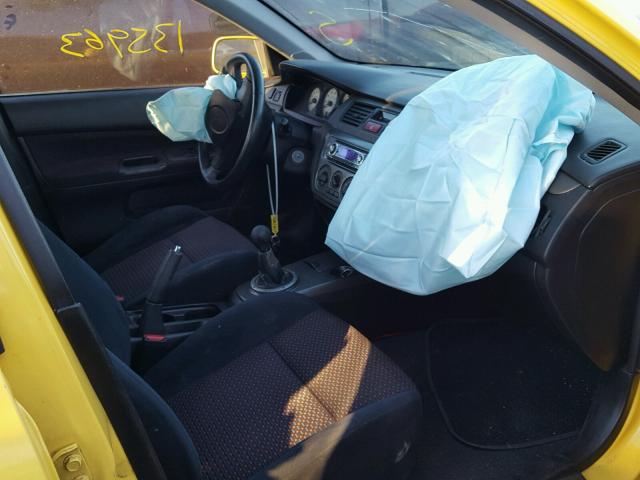 JA3AJ66F04U023260 - 2004 MITSUBISHI LANCER RAL YELLOW photo 5